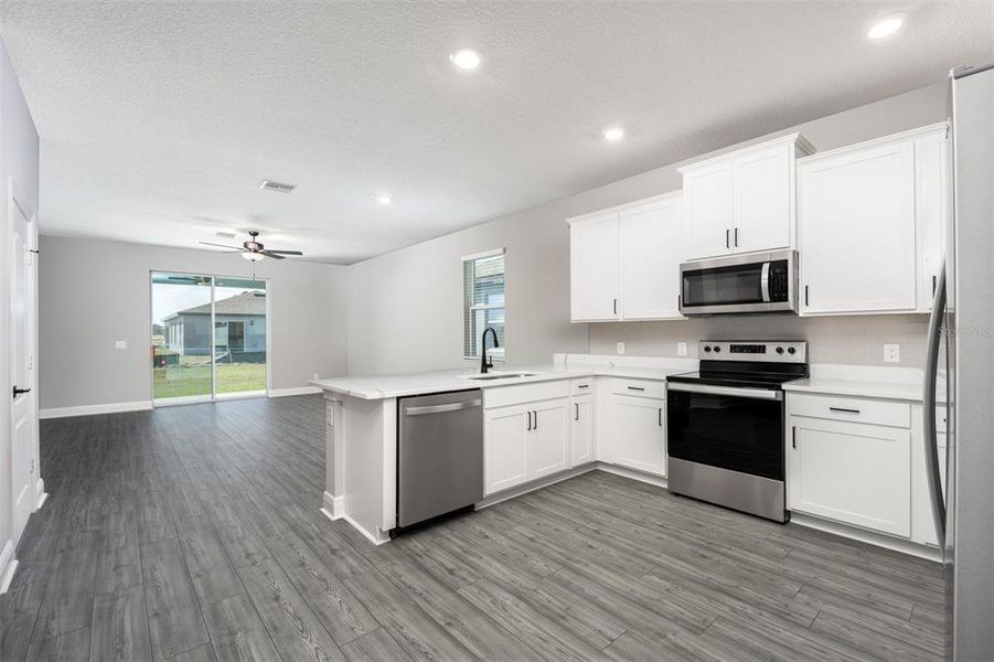 Furnished interior view inside a new home in Gum Lake Preserve, Lake Alfred (Image 3).