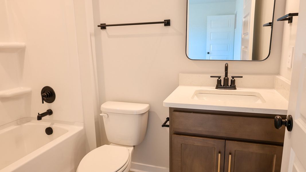 Representative furnished interior of a home built from the TISDALE by D.R. Horton in Harvest Point, Spring Hill (Image 16).