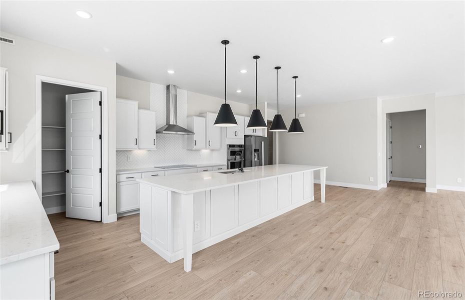 Furnished interior view inside a new home in Hilltop at Inspiration, Aurora (Image 10).
