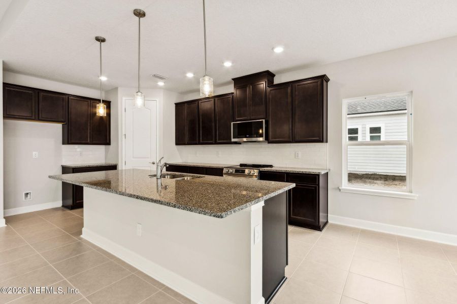 Furnished interior view inside a new home in Sandy Ridge, Yulee (Image 5).