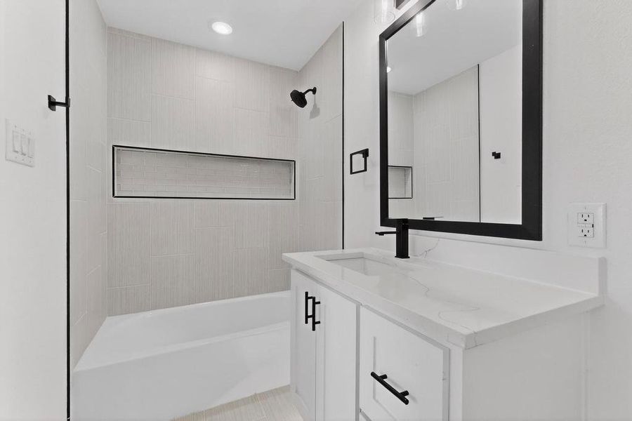 Full bath with vanity, bathing tub / shower combination, and recessed lighting