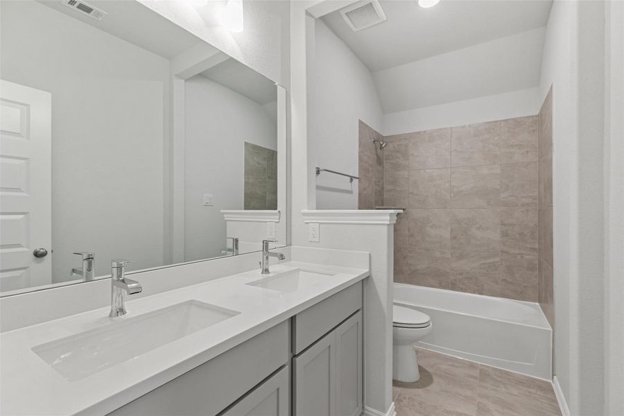 Furnished interior view inside a new home in Park at Eldridge, Sugar Land (Image 15). Furnished interior view inside a new home in Park at Eldridge, Sugar Land (Image 15).