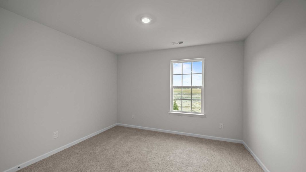 Spacious, unfurnished interior of a new home in Ridgewood Farms, Winterville (Image 24).