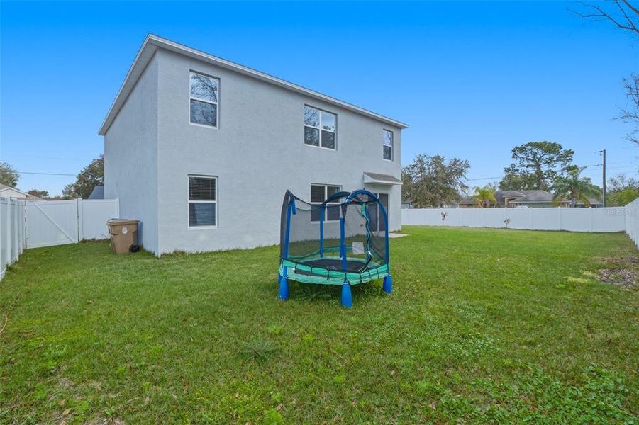 Exterior details and patio area of a home in Poinciana Enclave, Kissimmee (Image 17).