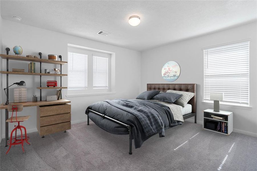 Secondary bedroom features plush carpet, custom paint, lighting, ample closet space, and large windows with privacy blinds.