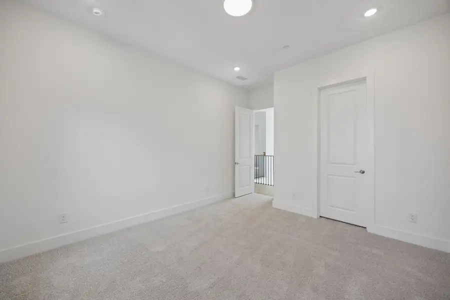 Spacious, unfurnished interior of a new home in Newman Village Townhomes, Frisco (Image 28).