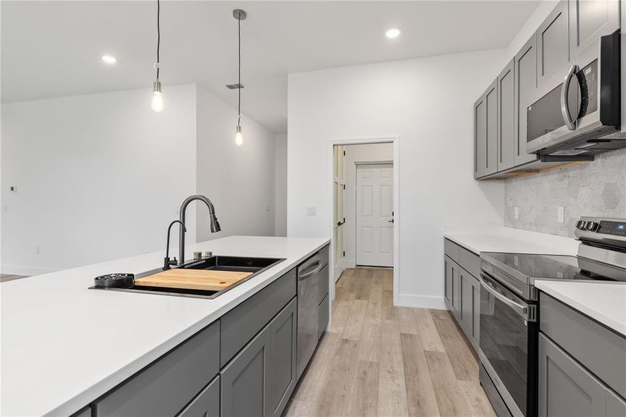 Furnished interior view inside a new home in , Port Charlotte (Image 13).