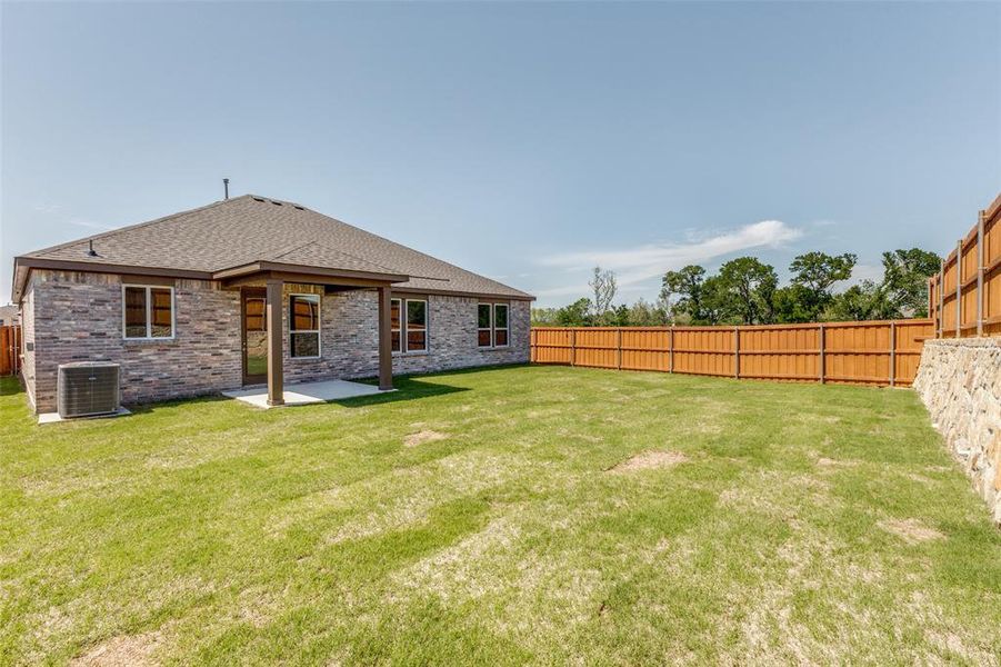 Front exterior of a new home in Heartland Signature, Crandall, TX, highlighting curb appeal (Image 11). Front exterior of a new home in Heartland Signature, Crandall, TX, highlighting curb appeal (Image 11).