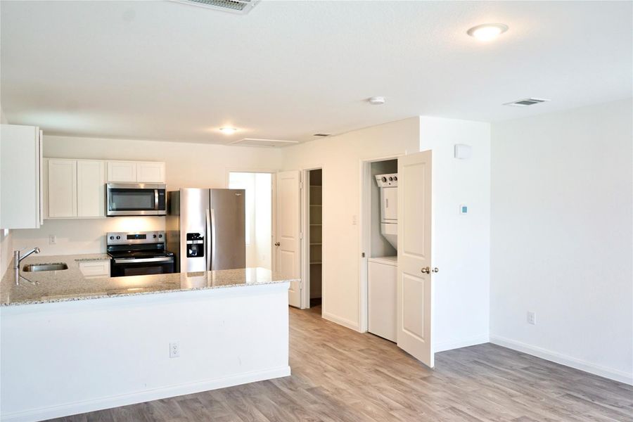 Furnished interior view inside a new home in , Conroe (Image 5).