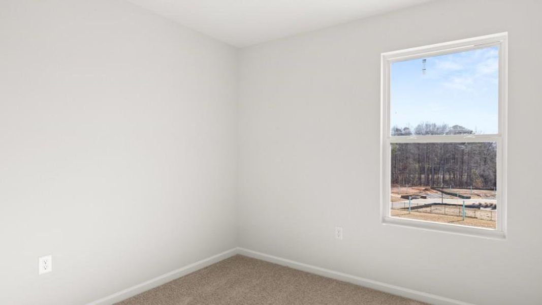 Spacious, unfurnished interior of a new home in Waypoint, Flowery Branch (Image 17).