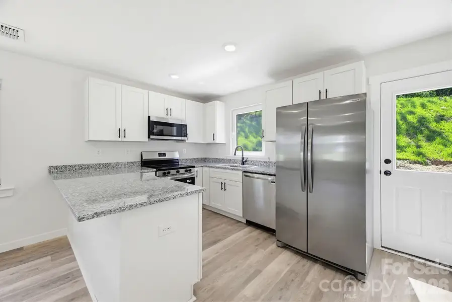 Furnished interior view inside a new home in , Conover (Image 6).