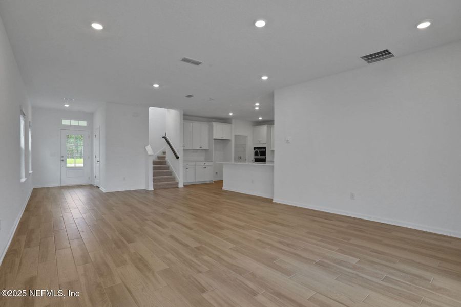 Spacious, unfurnished interior of a new home in TrailMark, St. Augustine (Image 39).