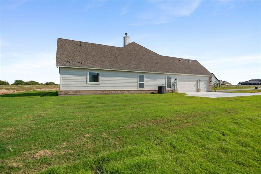 Front exterior of a new home in Fairview Meadows, New Fairview, TX, highlighting curb appeal (Image 24). Front exterior of a new home in Fairview Meadows, New Fairview, TX, highlighting curb appeal (Image 24).
