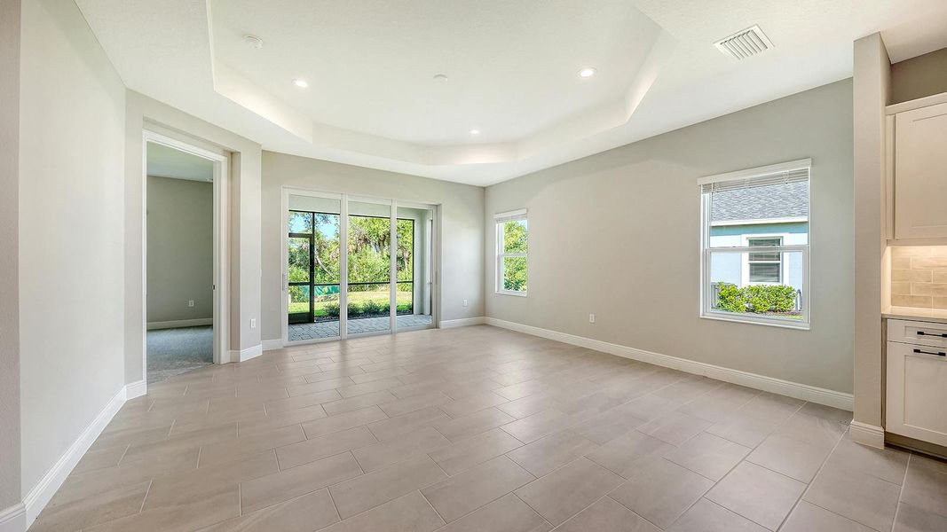 Spacious, unfurnished interior of a new home in Wildleaf Real Estate and Homes for Sale in Parrish, FL - Neal Communities, Parrish (Image 25).