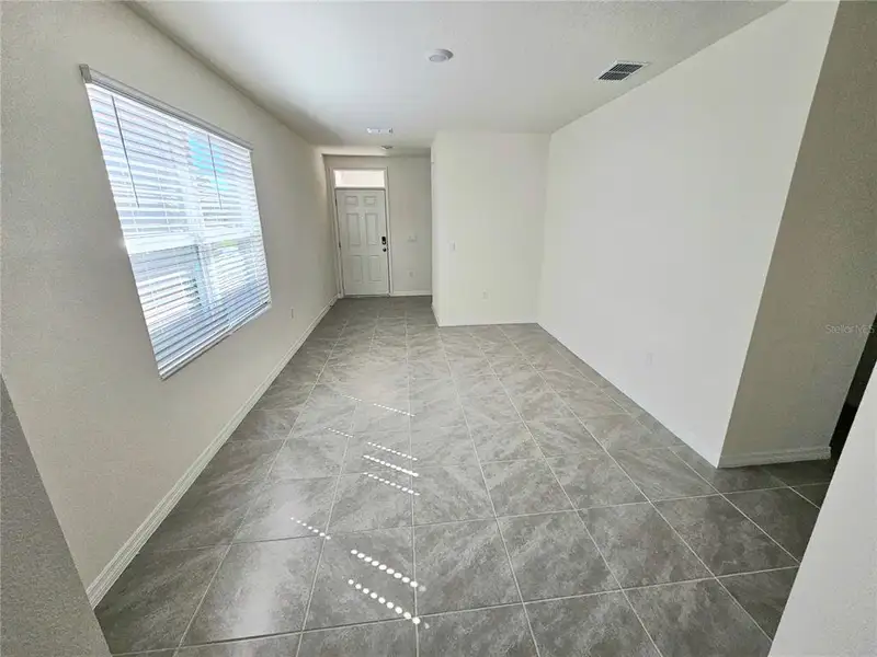 Spacious, unfurnished interior of a new home in Charles Cove Express, Davenport (Image 6).