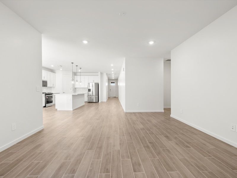 Spacious, unfurnished interior of a new home in Blossom Rock Reserve Series, Apache Junction (Image 7).