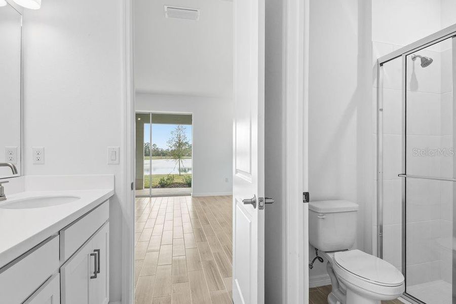 Furnished interior view inside a new home in Ardisia Park, New Smyrna Beach (Image 10).