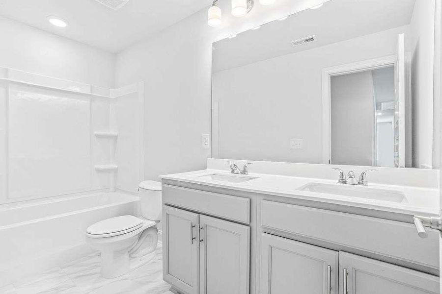 Furnished interior view inside a new home in Waters Edge, Mansfield (Image 5).