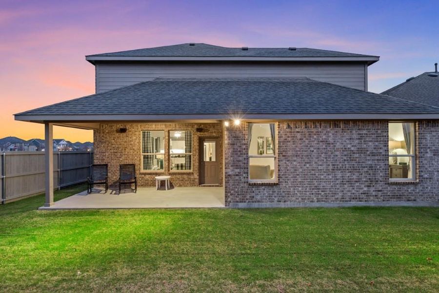 Exterior details and patio area of a home in Pecan Square, Northlake (Image 2).
