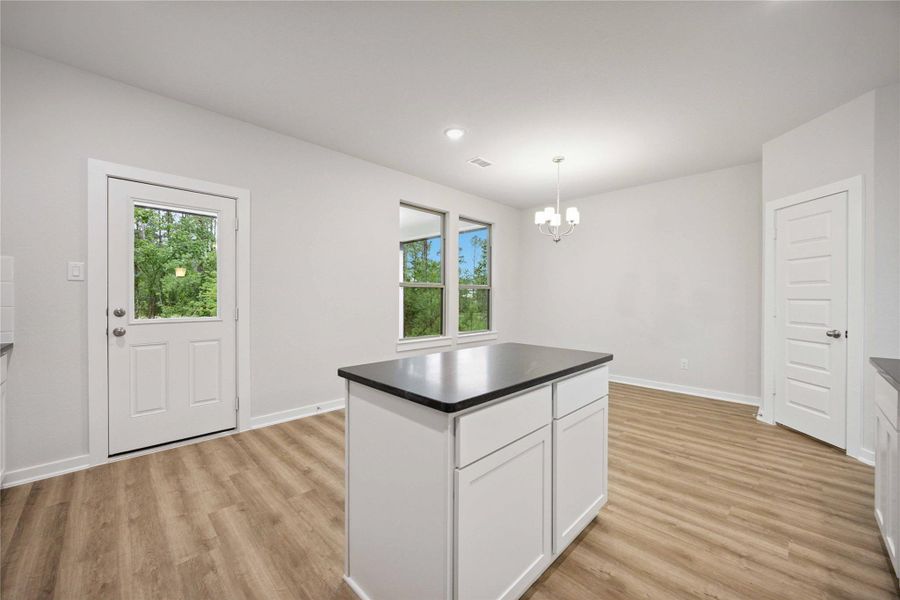 Furnished interior view inside a new home in Deer Pines, Conroe (Image 6).
