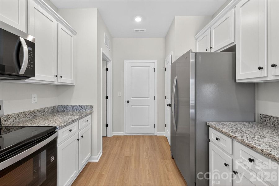 Furnished interior view inside a new home in Stagecoach Station, Gastonia (Image 3).