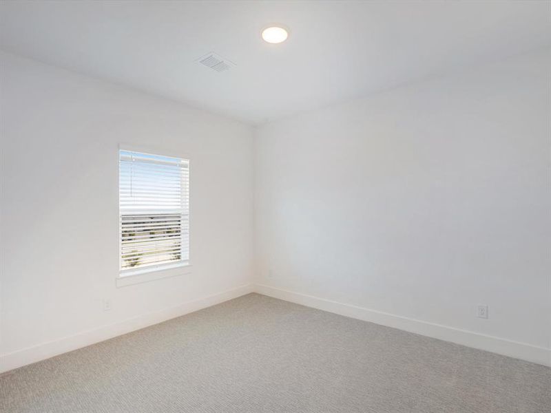 Spacious, unfurnished interior of a new home in Royal Court, Little Elm (Image 13).