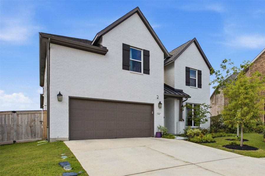 Front exterior of a new home in Nolina, Georgetown, TX, highlighting curb appeal (Image 23).