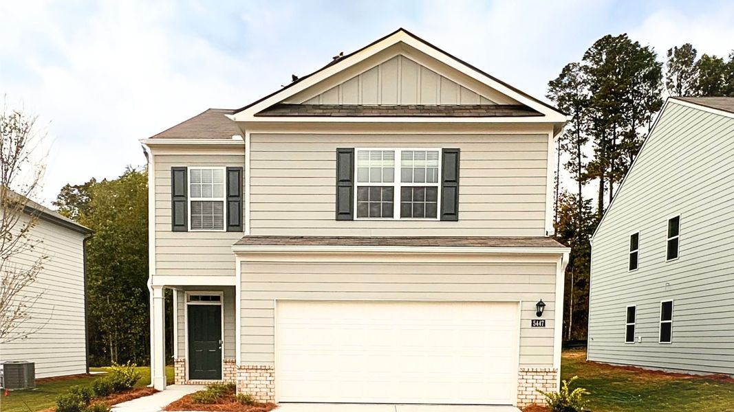 Front exterior of a new home in Sherwood Manor, Atlanta, GA, highlighting curb appeal (Image 1). Front exterior of a new home in Sherwood Manor, Atlanta, GA, highlighting curb appeal (Image 1).