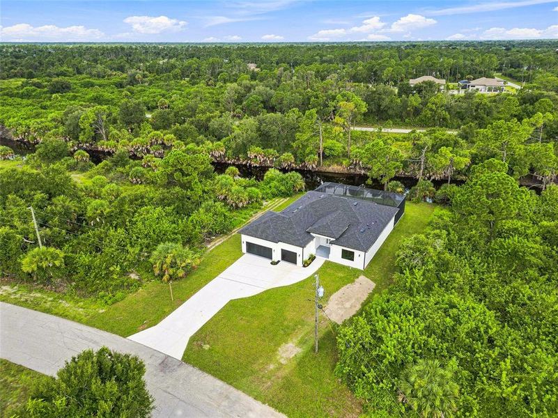 Front exterior of a new home in , Port Charlotte, FL, highlighting curb appeal (Image 28). Front exterior of a new home in , Port Charlotte, FL, highlighting curb appeal (Image 28).