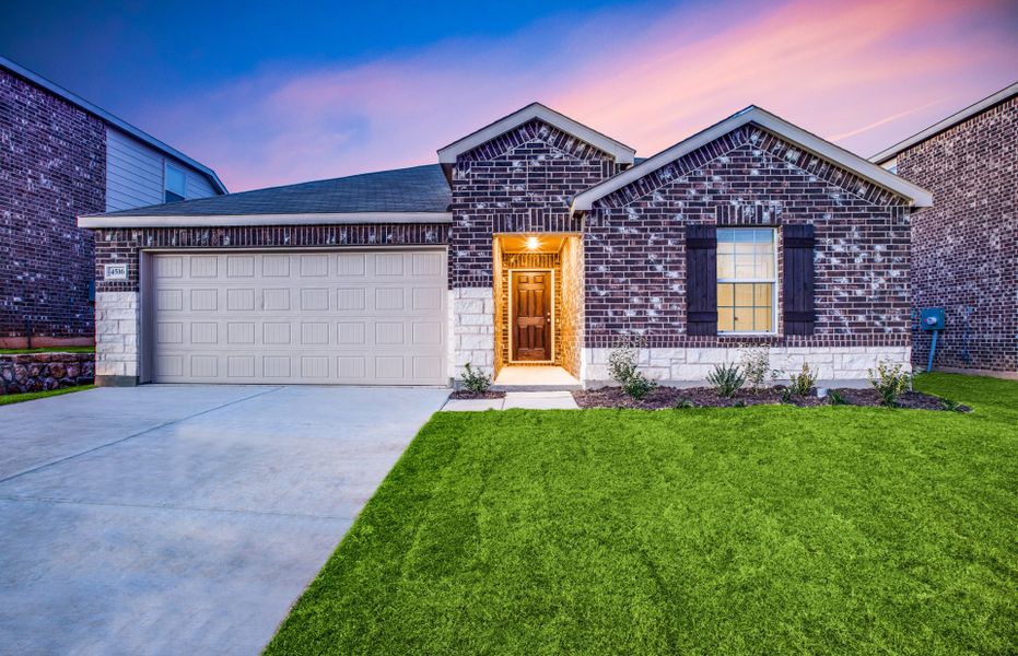 The Rayburn, a one-story home with 2-car garage, s