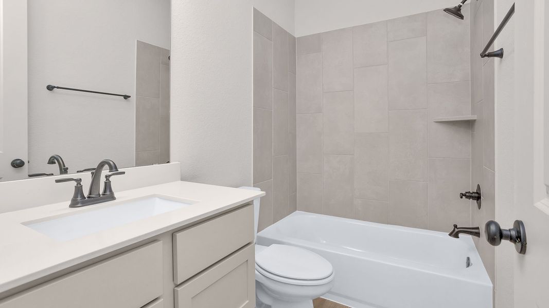 Furnished interior view inside a new home in Grand Central Park, Conroe (Image 10).