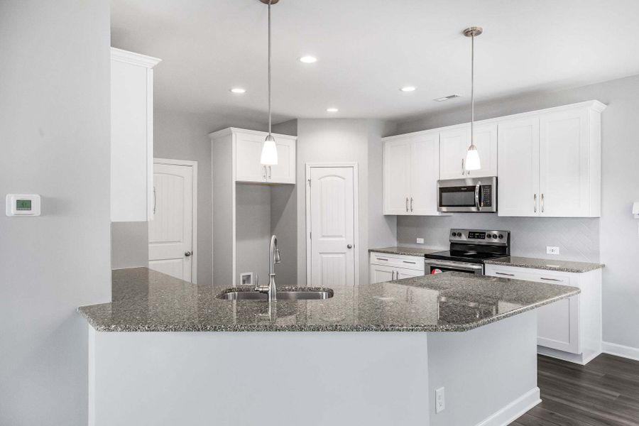 Representative furnished interior of a home built from the Springfield by Caviness & Cates Communities in Sutherland Station at Olde Liberty, Franklinton (Image 92). Representative furnished interior of a home built from the Springfield by Caviness & Cates Communities in Sutherland Station at Olde Liberty, Franklinton (Image 92).