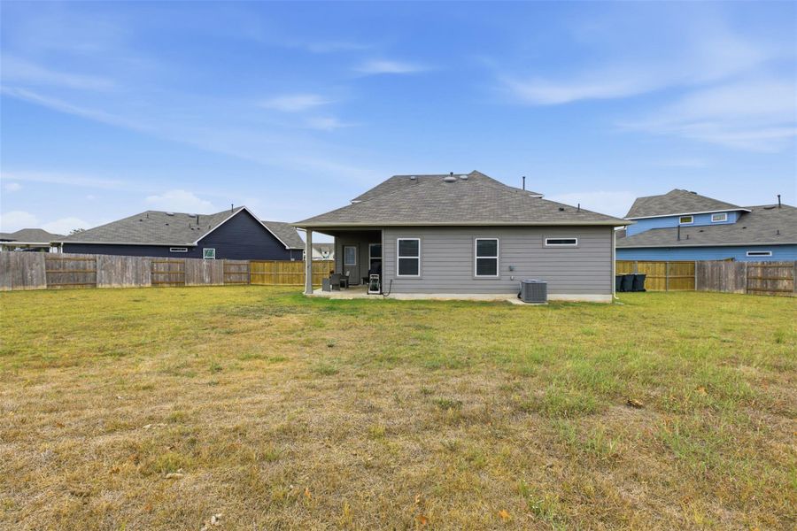 Back of house featuring a patio and a fenced backyard