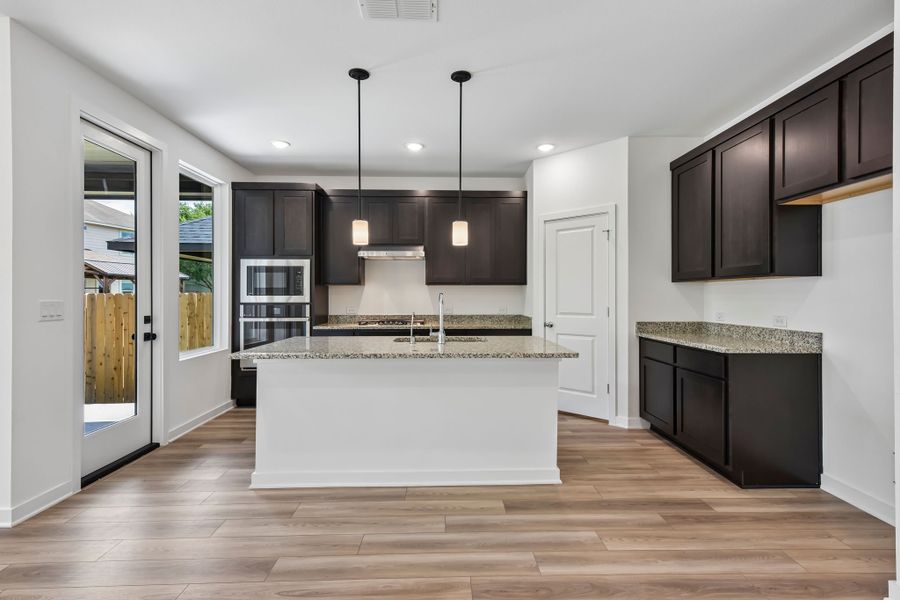 Furnished interior view inside a new home in Parkton Square, Kyle (Image 6).