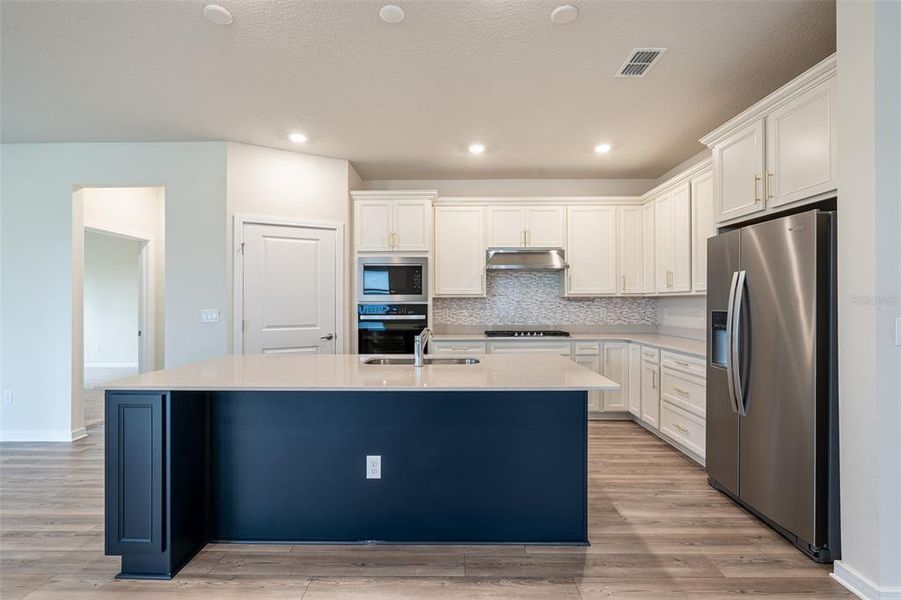 Furnished interior view inside a new home in Willow Ridge, Montverde (Image 5).