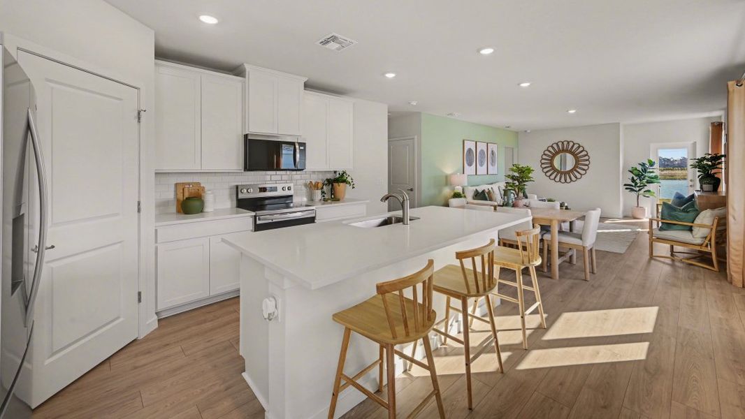 Representative furnished interior of a home built from the Harper by D.R. Horton in Bentley Crossing - Express & Tradition, Fort Myers (Image 10).