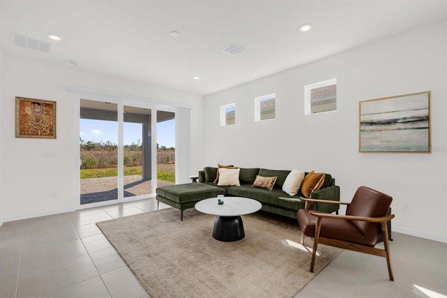 Furnished interior view inside a new home in Tohoqua Reserve, Kissimmee (Image 11).