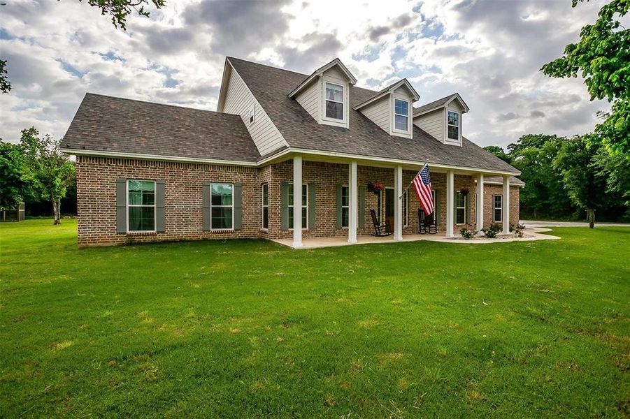 Home with large front porch. Home with large front porch.