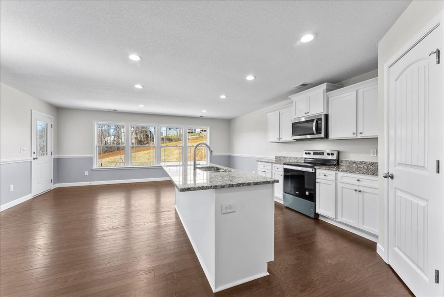 Representative furnished interior of a home built from the Emilia by Enchanted Homes in Guadalupe Heights, Seguin (Image 13).