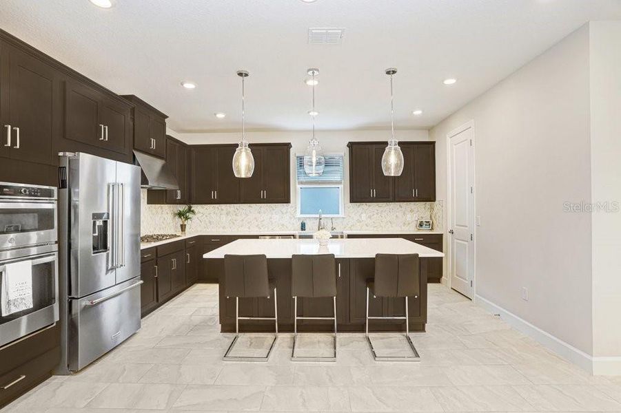 Furnished interior view inside a new home in Esplanade at Artisan Lakes, Palmetto (Image 31).