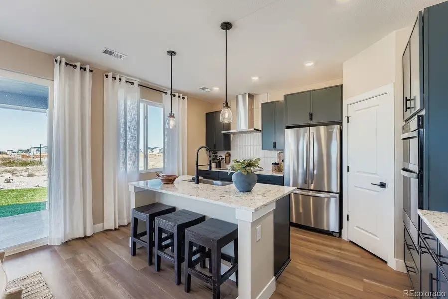 Furnished interior view inside a new home in Wolf Creek Run, Strasburg (Image 4).