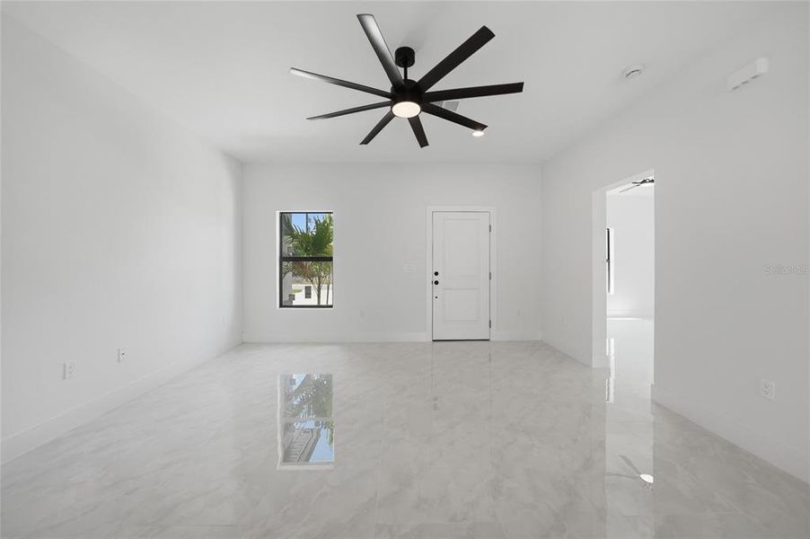Spacious, unfurnished interior of a new home in , Port Charlotte (Image 17).