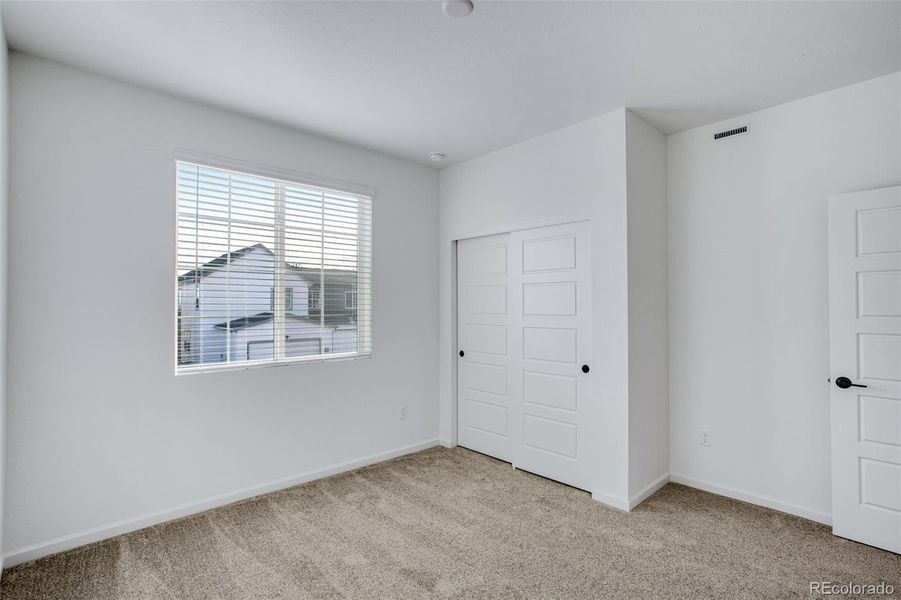Spacious, unfurnished interior of a new home in Westside Crossing Townhomes, Berthoud (Image 33).