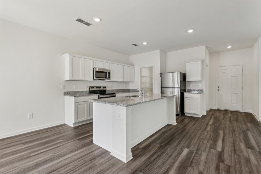 Furnished interior view inside a new home in Castlewood South, Taylor (Image 4).