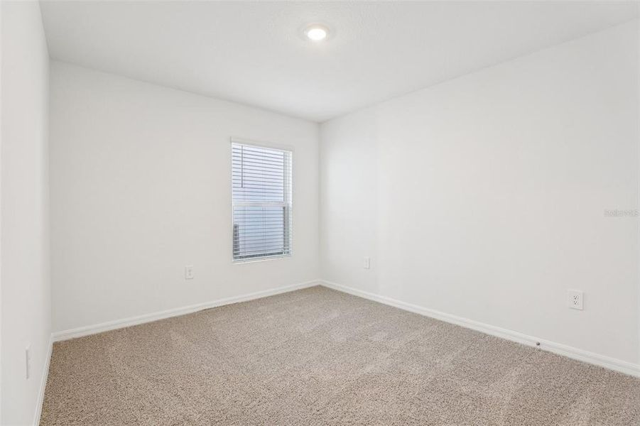 Spacious, unfurnished interior of a new home in Villamar, Winter Haven (Image 17).