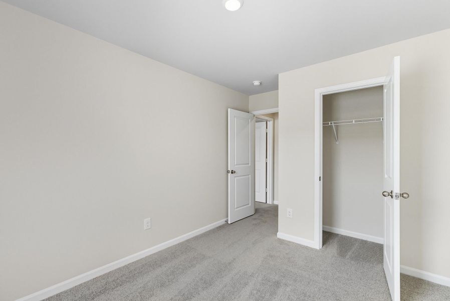 Representative unfurnished interior of a home built from the Palmetto II by McGuinn Homes in Clarke Townes, Anderson (Image 64).