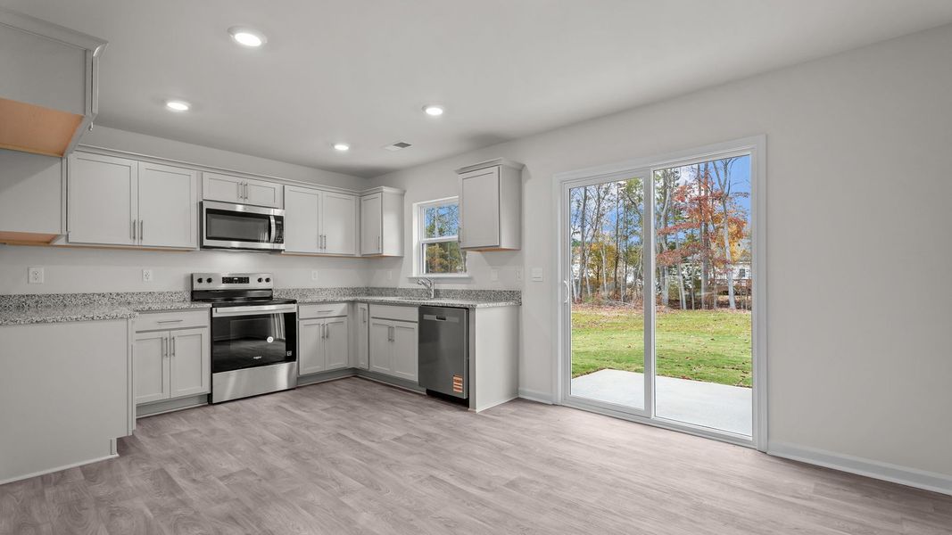 Representative furnished interior of a home built from the Rachel by D.R. Horton in Hobbs Farm, Ayden (Image 6).