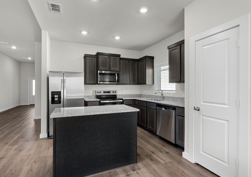 The kitchen has a convenient kitchen island.