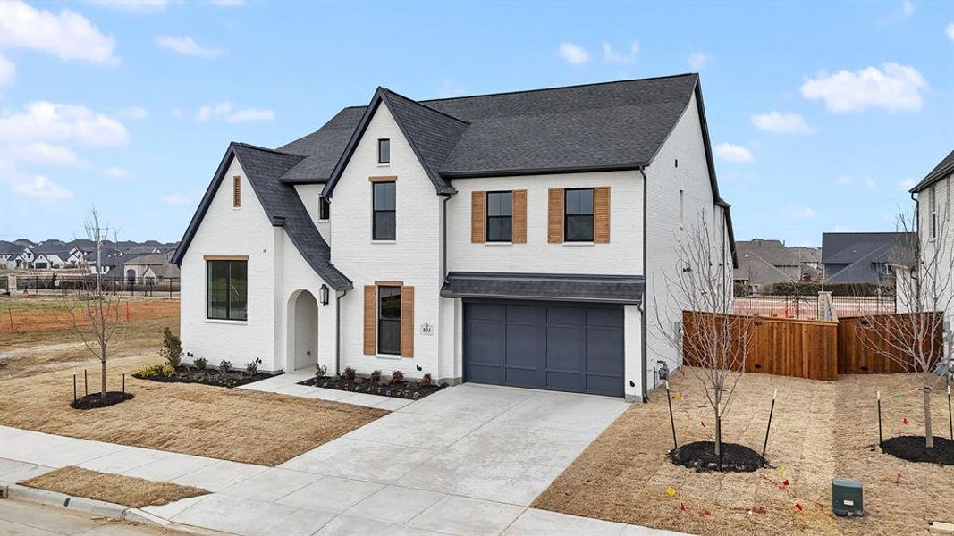 Front exterior of a new home in , Prosper, TX, highlighting curb appeal (Image 1). Front exterior of a new home in , Prosper, TX, highlighting curb appeal (Image 1).