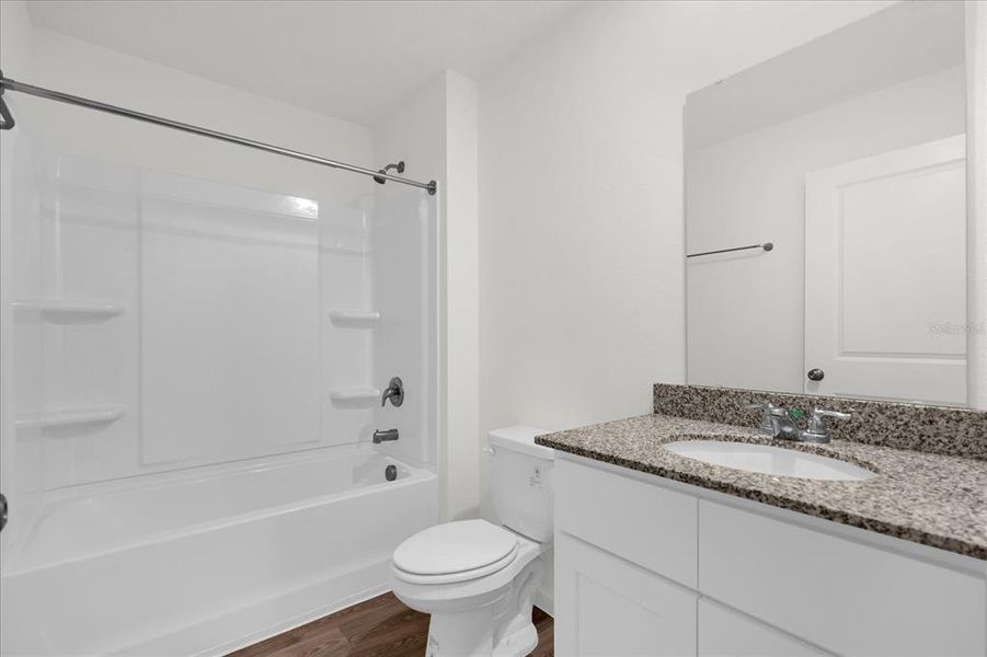 Furnished interior view inside a new home in Poinciana Village, Kissimmee (Image 8).